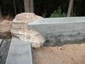 Concrete bench using native bolders 